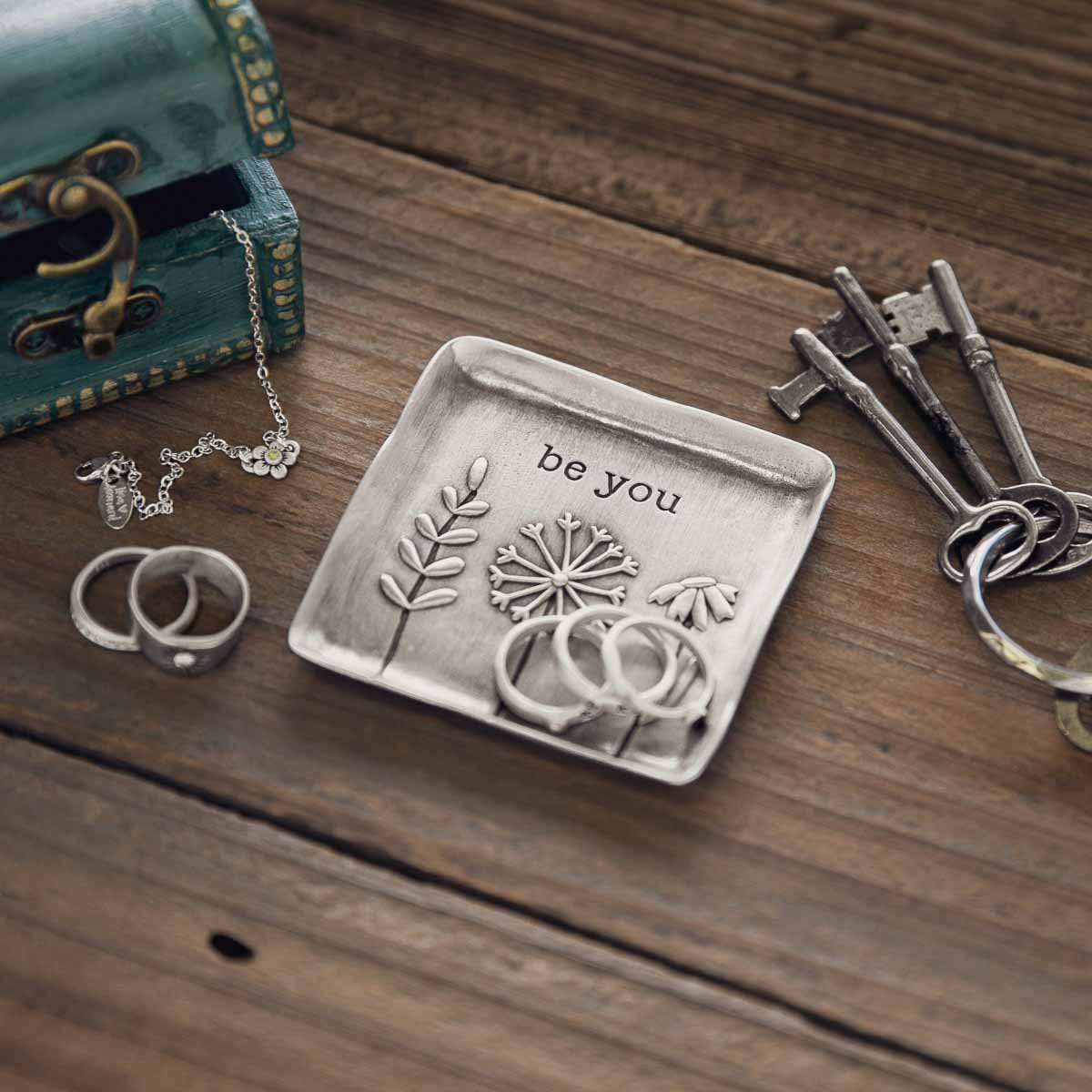 be you pewter keepsake dish on marble background
