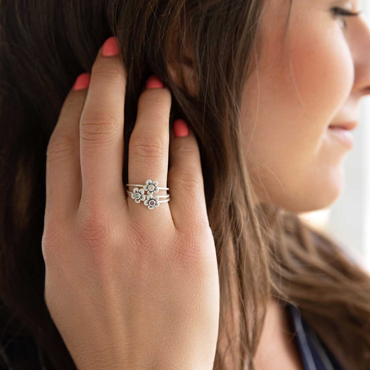 Birthstone bloom ring handcrafted in sterling silver with an antiqued/satin finish set with a 2mm birthstone