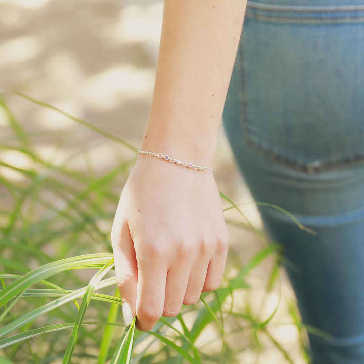 girl wearing sterling silver Dainty Finespun Birthstone Bracelet - Small