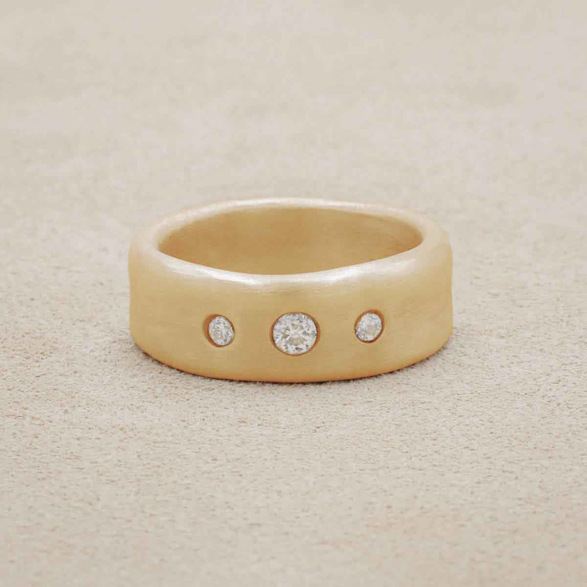 Faith Hope and Love ring hand-molded in 14k yellow gold set with a 3mm birthstone or diamond and two 2mm stones on the sides