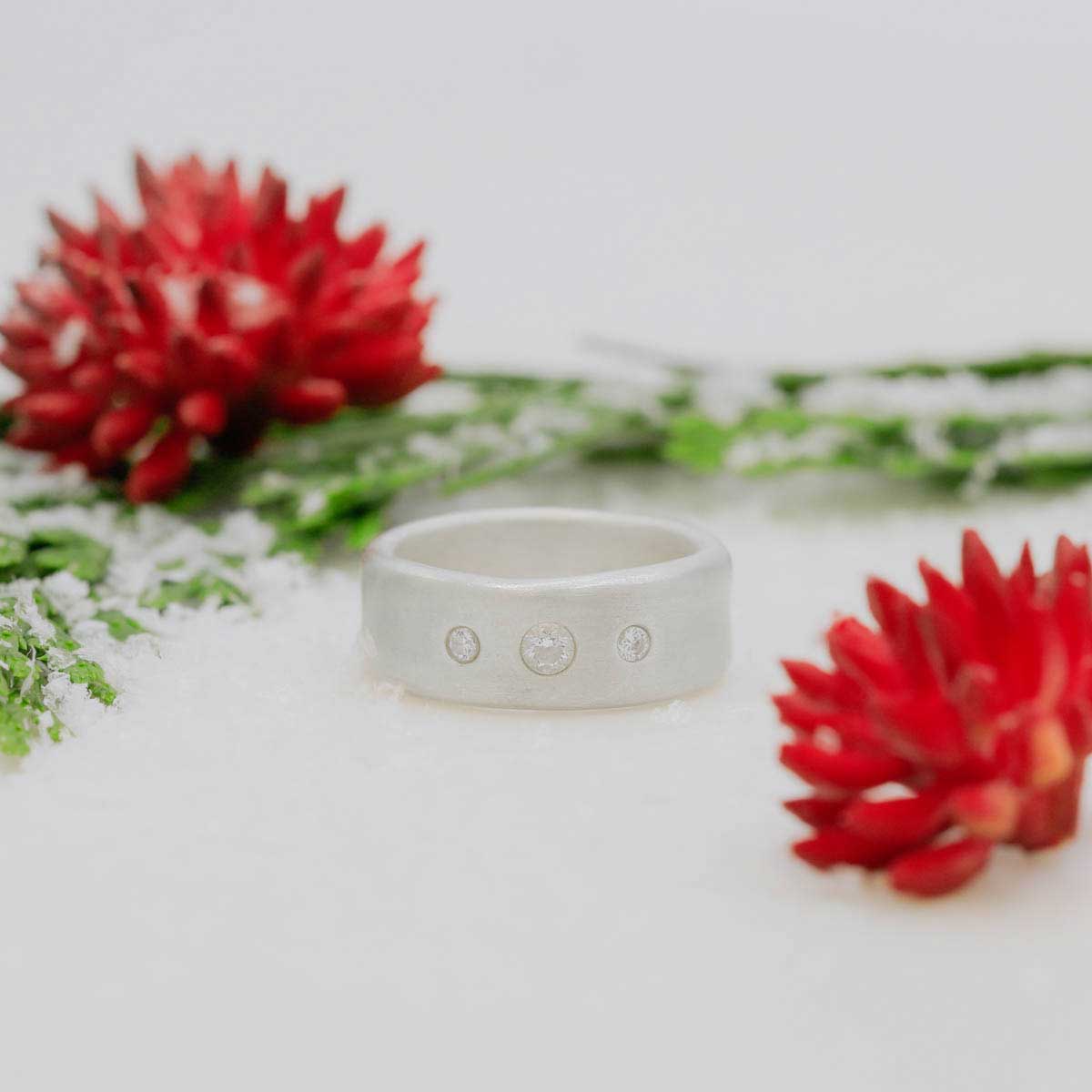 Faith Hope and Love ring hand-molded in sterling silver set with a 3mm birthstone or diamond and two 2mm stones on the sides