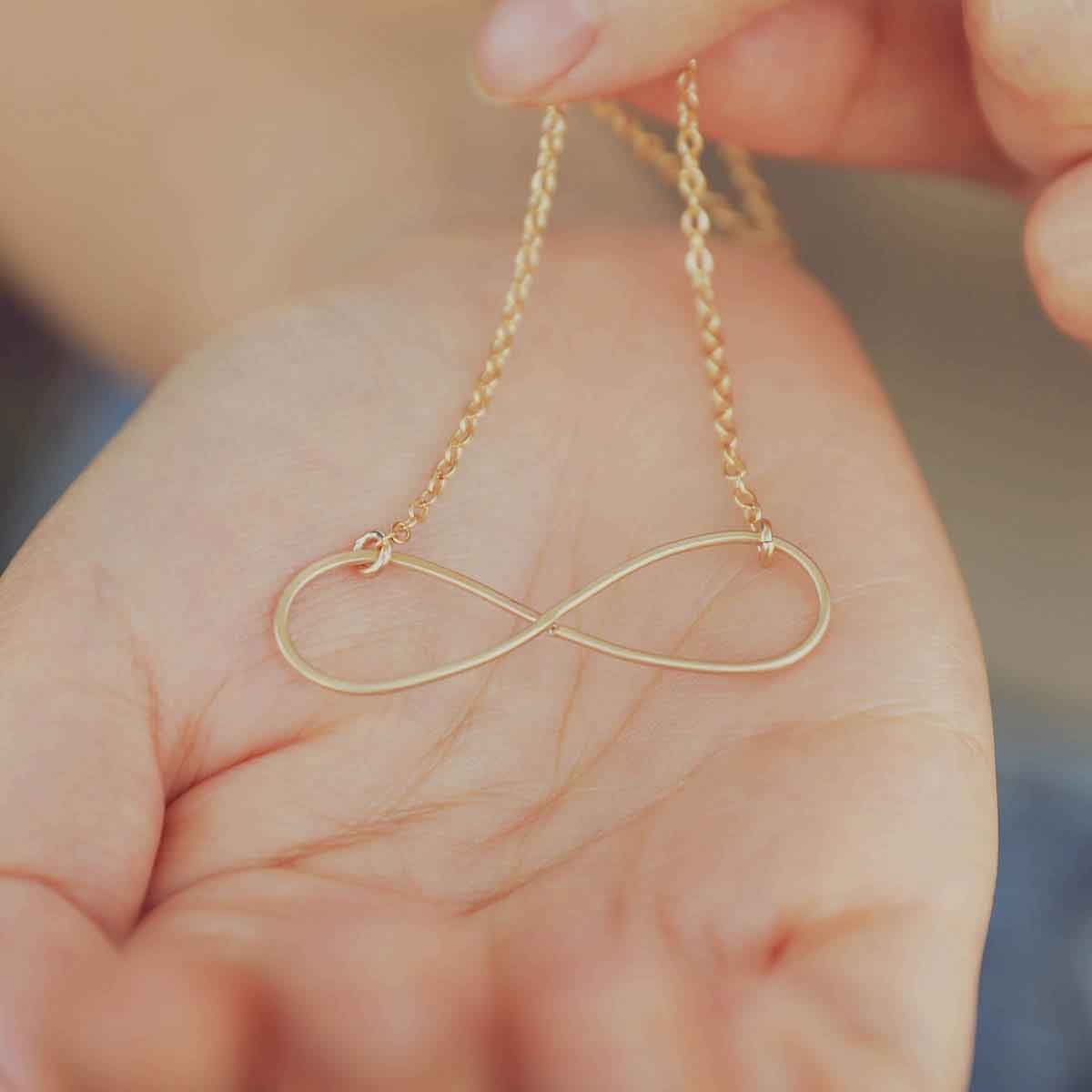 For Always Infinity Necklace in her backyard