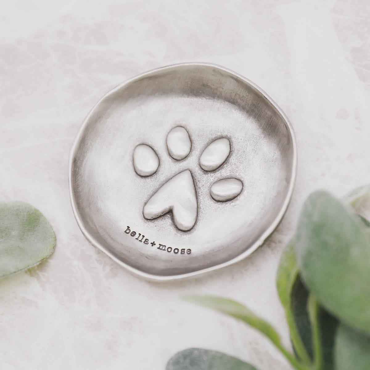 Girl holding a Furry Footprint Keepsake Dish