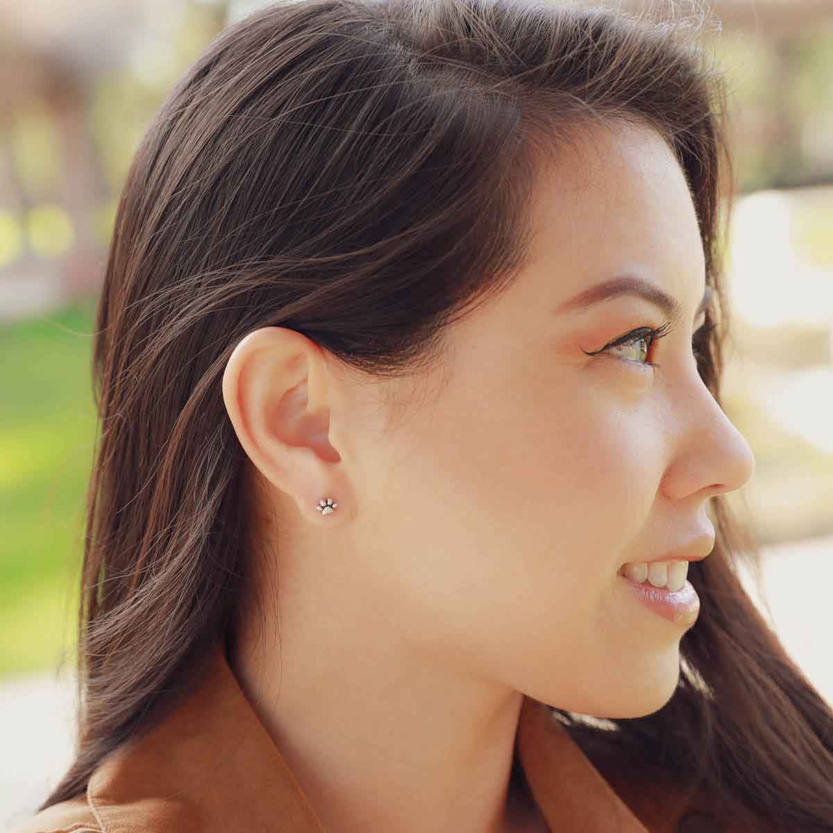 Furry Footprint Stud Earrings handcrafted in sterling silver