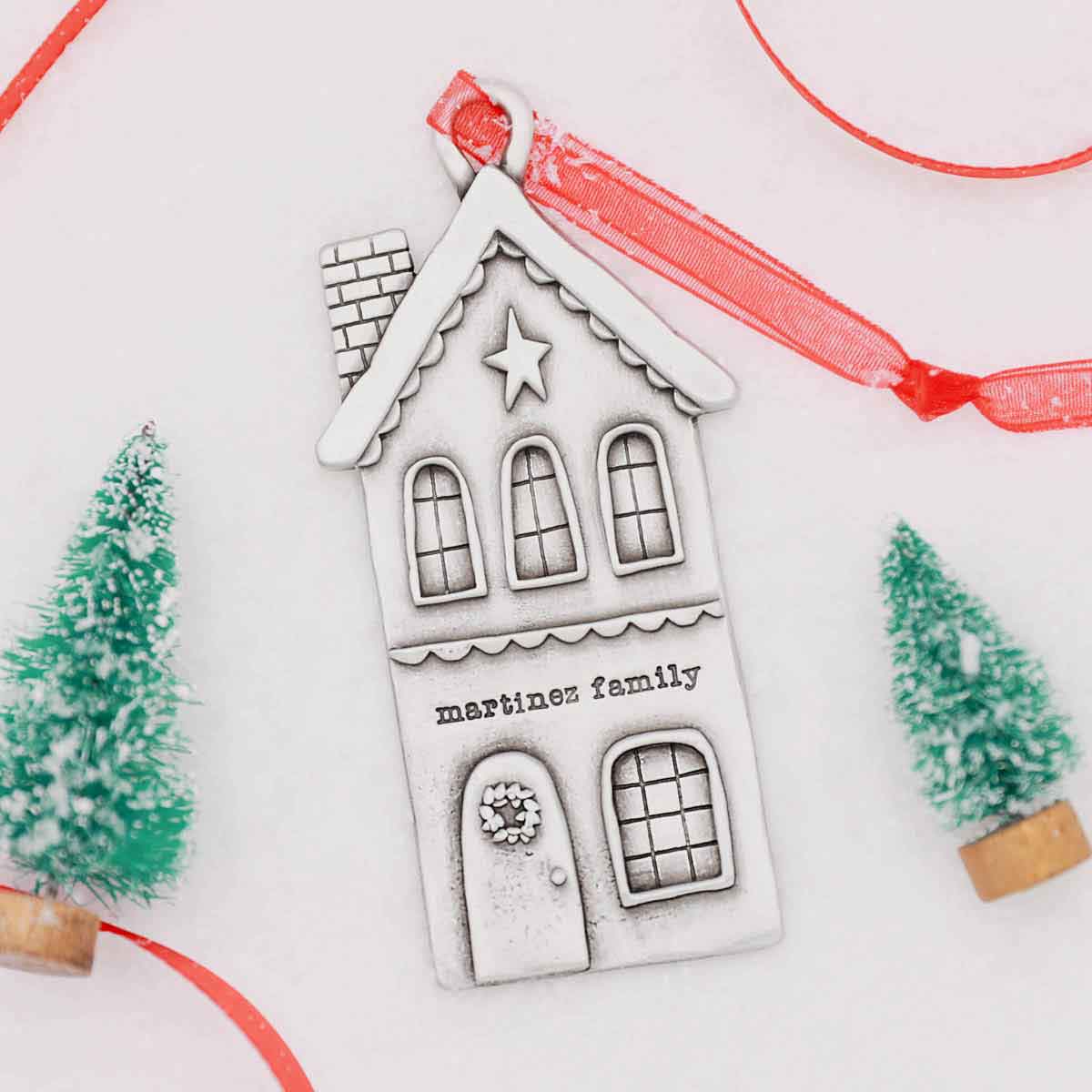 a personalized Heart of the Home pewter ornament, personalized with a meaningful phrase and name
