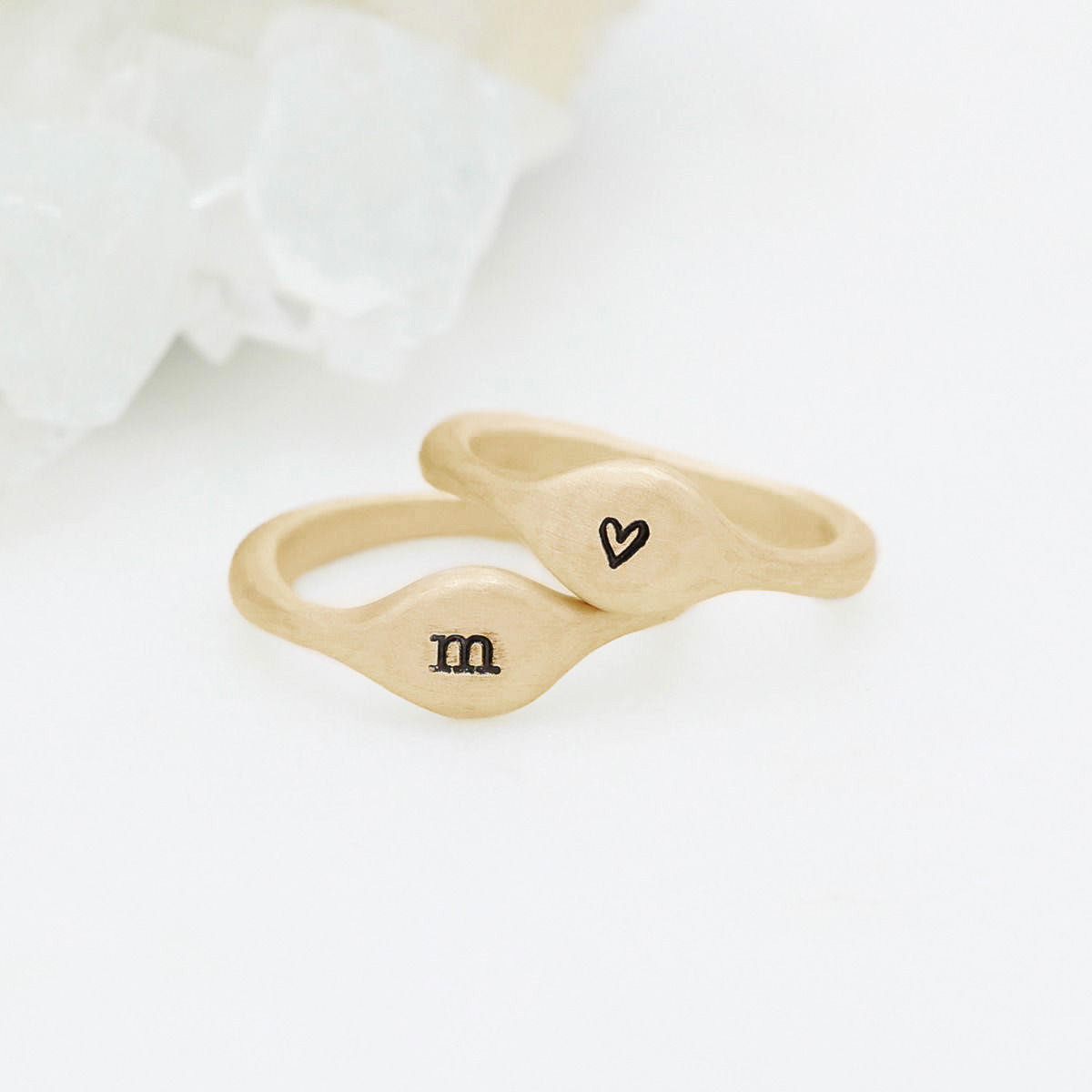 Initial stacking ring handcrafted and cast in 10k yellow gold then hand-stamped with an initial