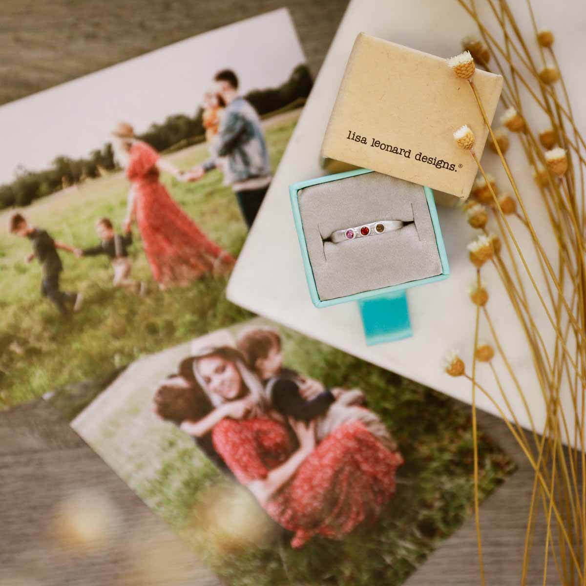 Handcrafted sterling silver mother's rings customizable with up to 6 genuine birthstones in original packaging