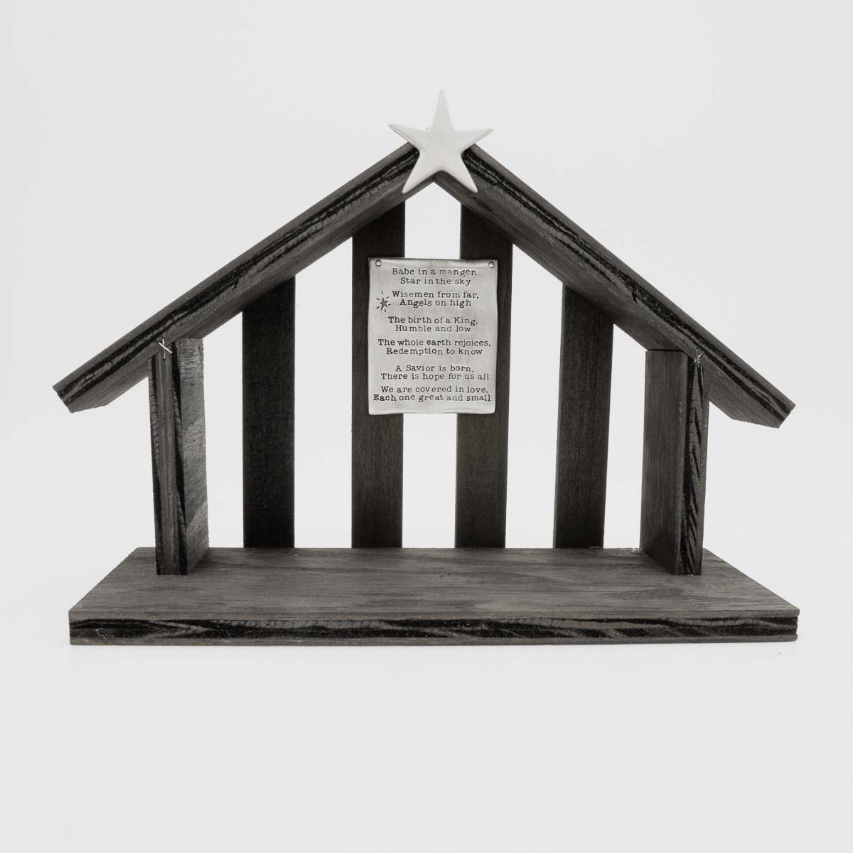 handcrafted wooden nativity stable that includes a pewter star and a hand-stamped poem
