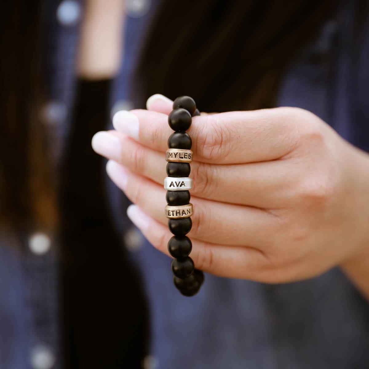 with choice of sterling silver or bronze beads that are customizable with names or dates