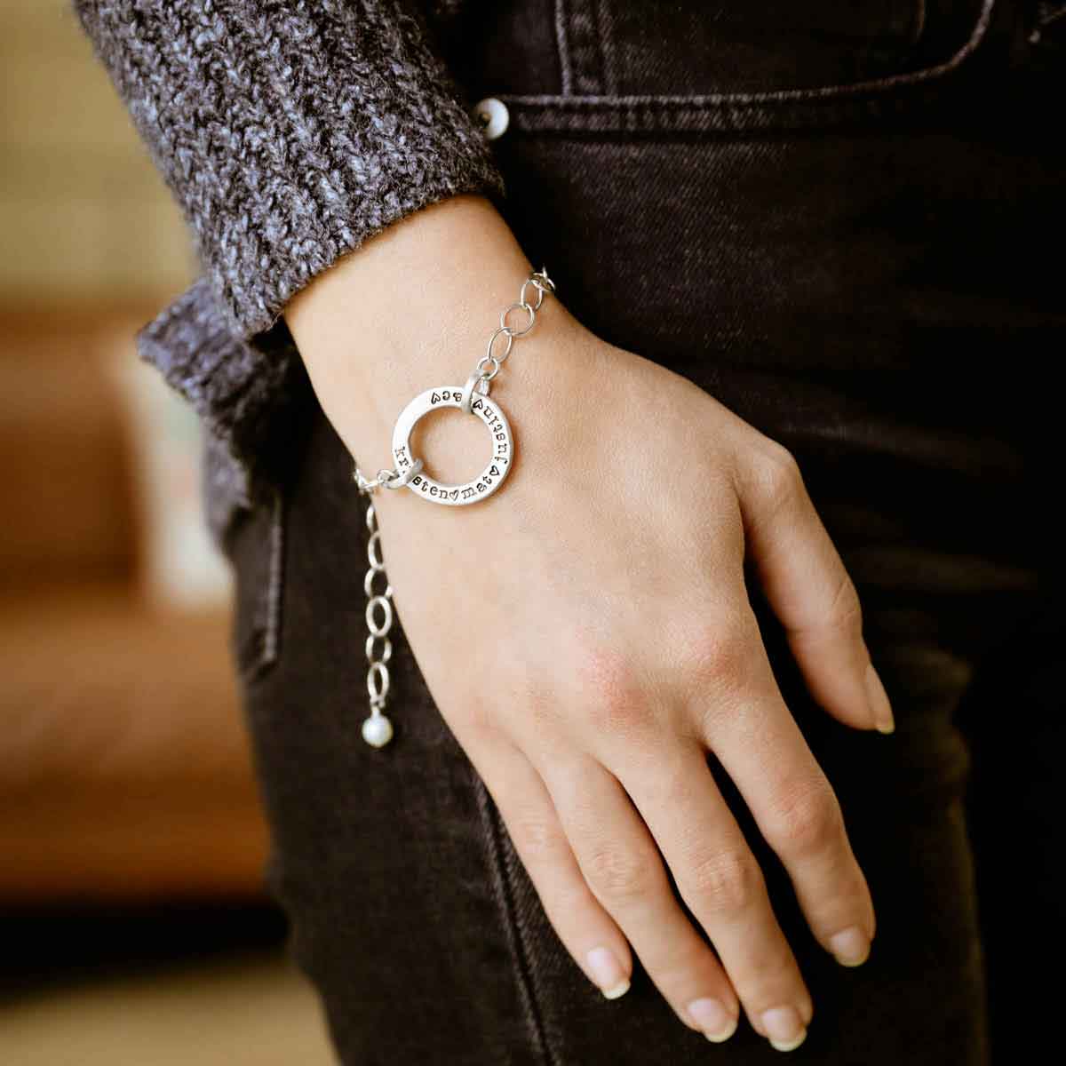 girl wearing personalized sterling silver open circle pearl bracelet