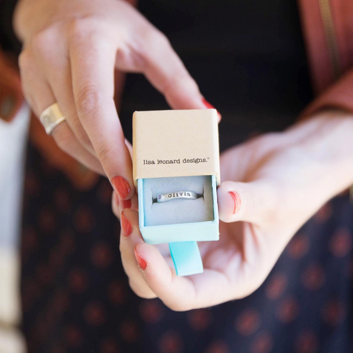 Personalized passage ring handcrafted in sterling silver with your choice of birthstone in original packaging