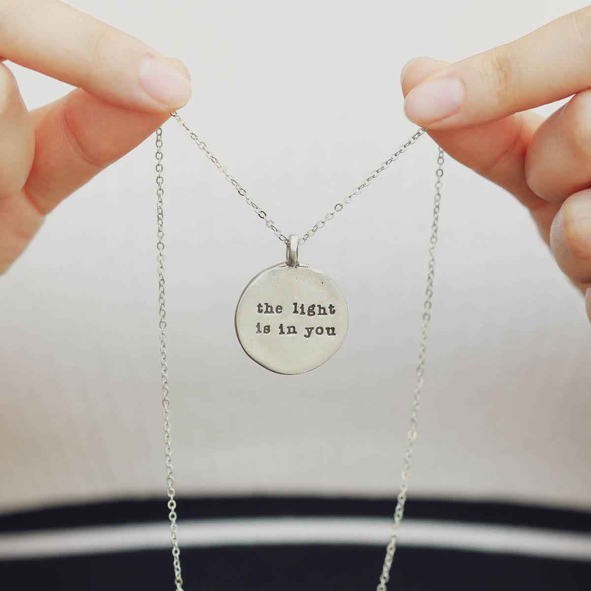 handcrafted in pewter with an 18" silver toned link chain