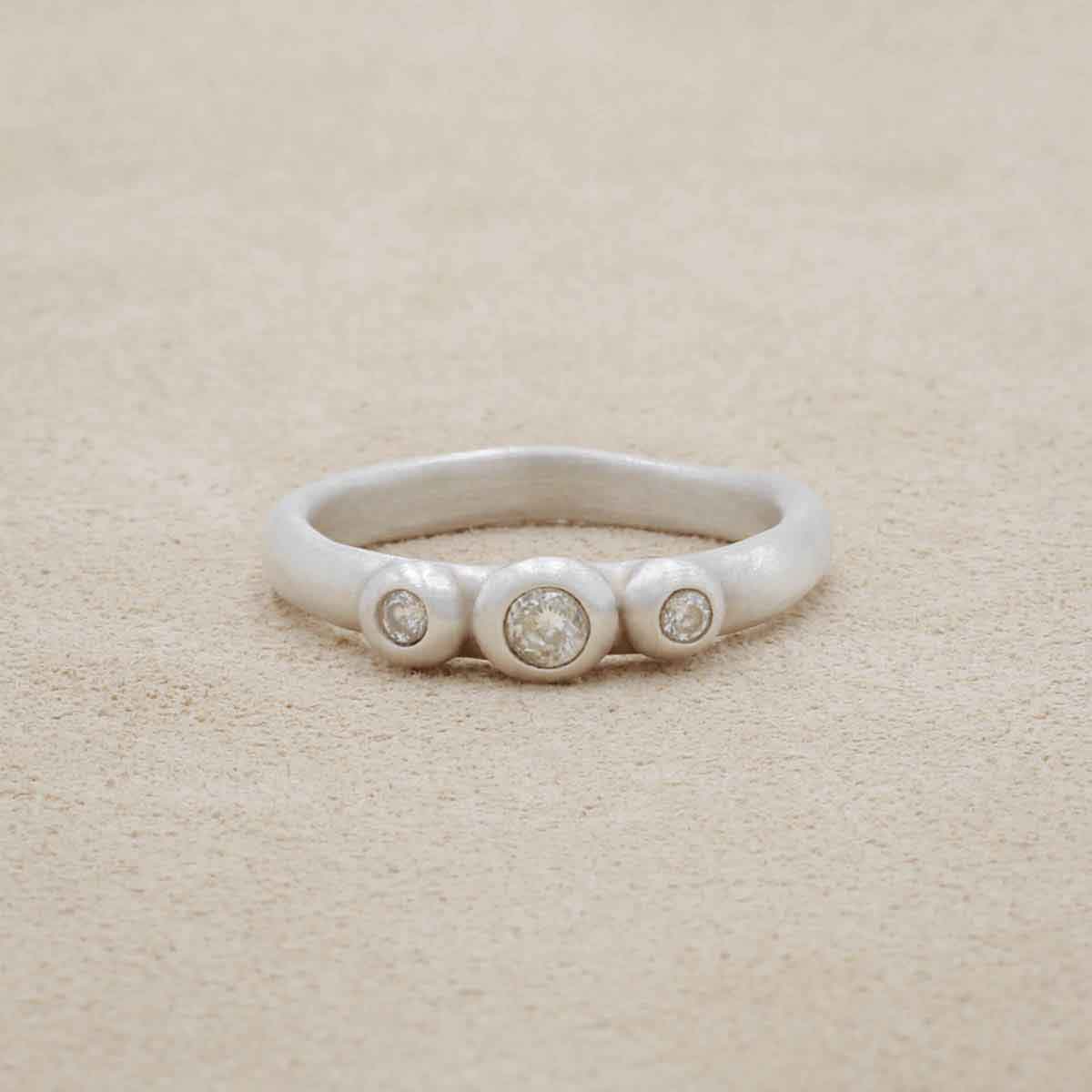 Togetherness ring, handcrafted in sterling silver, and set with two 2mm birthstone or diamond and one 3mm birthstone or diamond in the center