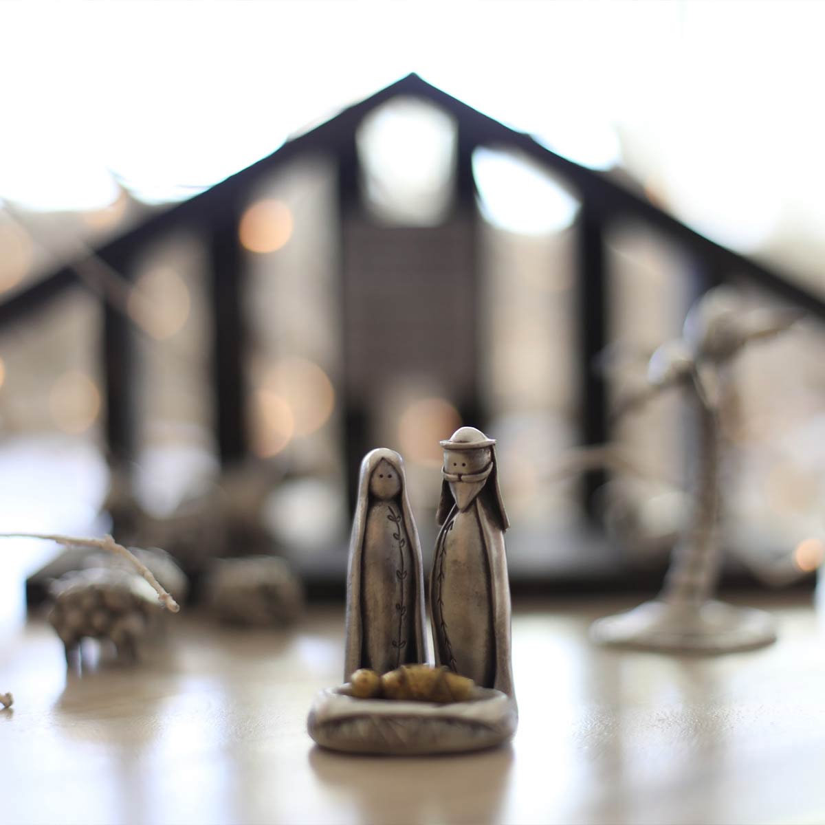 a shepherd and handcrafted animals