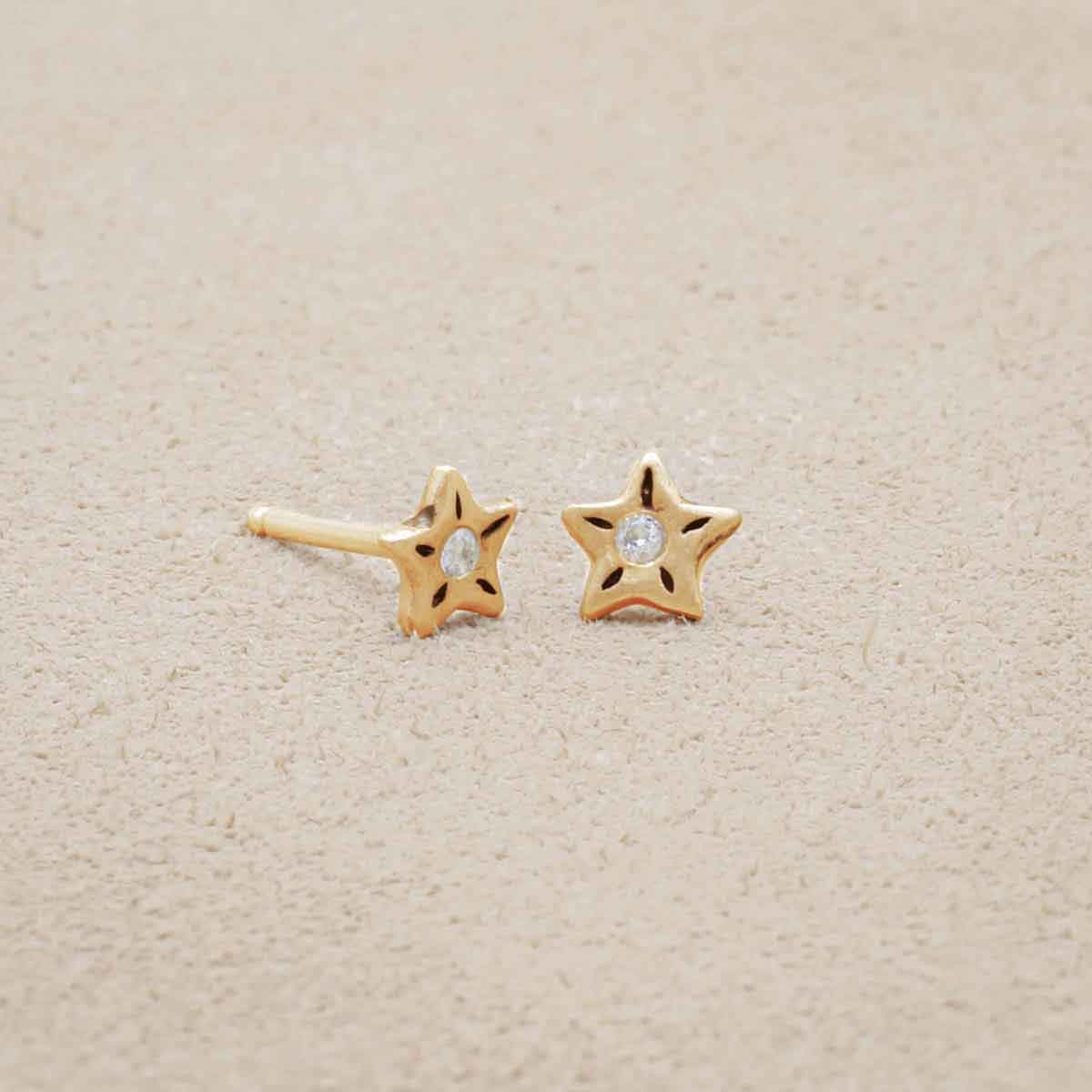 Your Spark Earrings, handcrafted in 10k yellow gold, set with a 1.5mm cubic zirconia