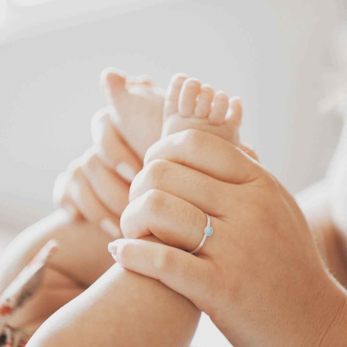 mom wearing a sterling silver Lighthearted Turquoise Ring