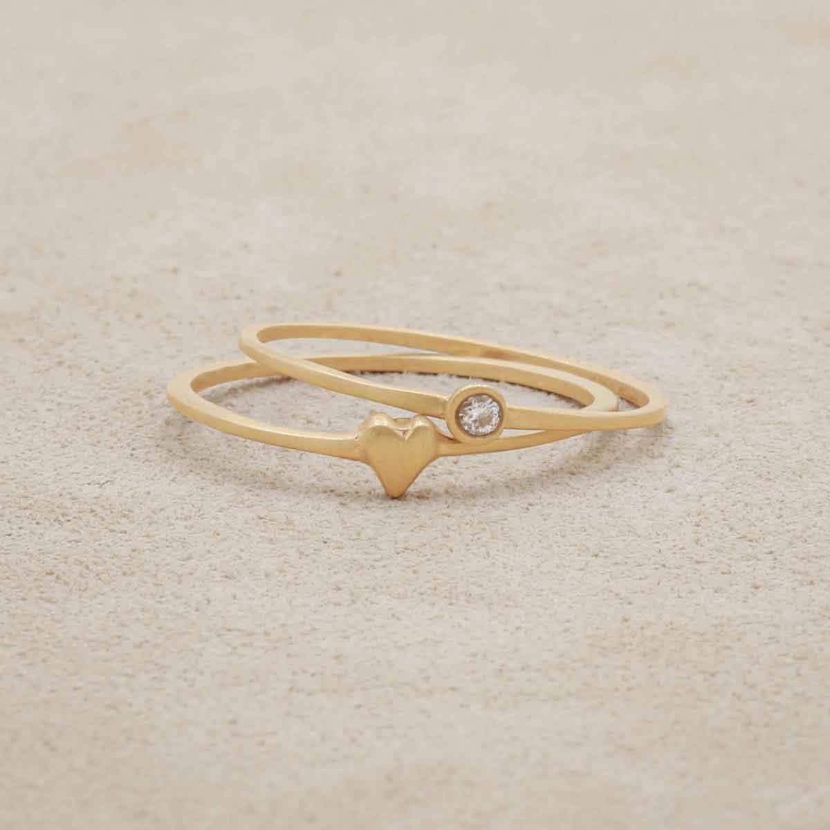 love and loss ring pair hand-molded and cast in 10k yellow gold including a finespun birthstone ring and a sweet love ring