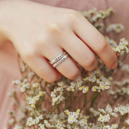 Girl wearing Personalized passage ring handcrafted in sterling silver with her choice of birthstone 