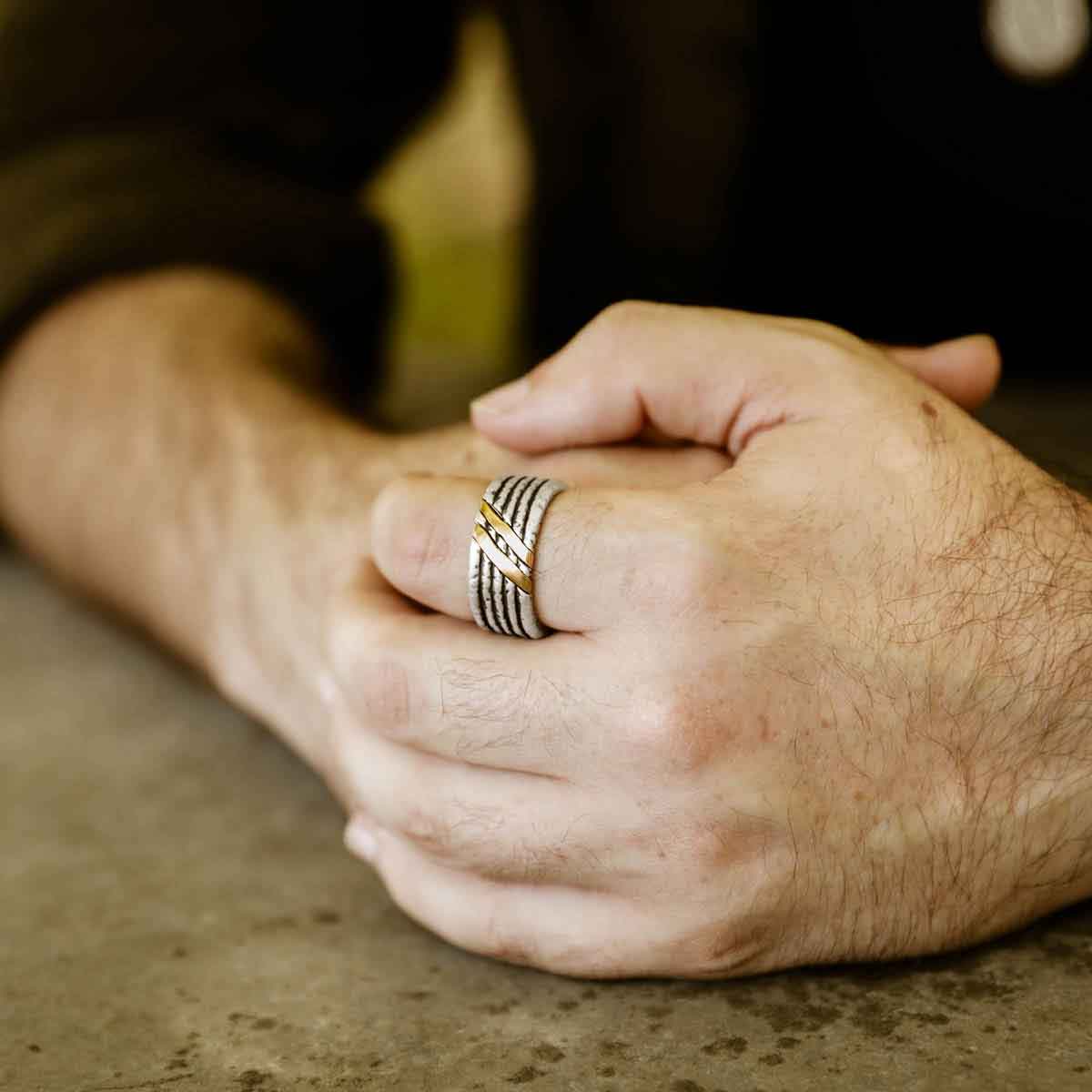 man wearing a Seven Ring